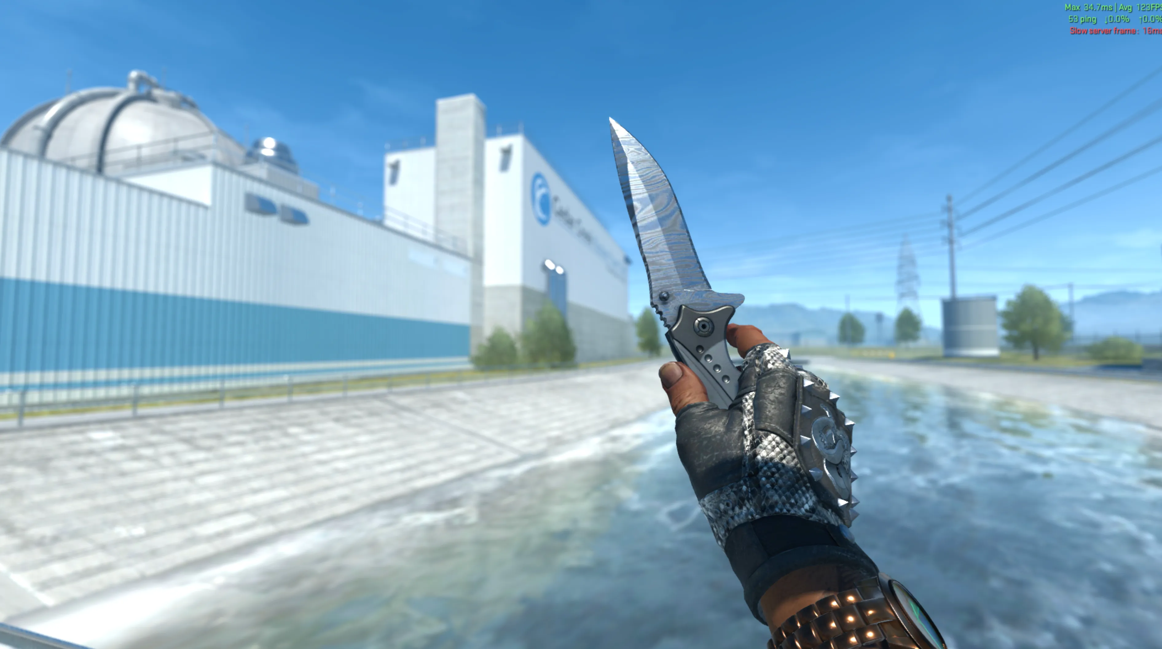 Nomad Knife Damascus Steel and Broken Fang Gloves Unhinged